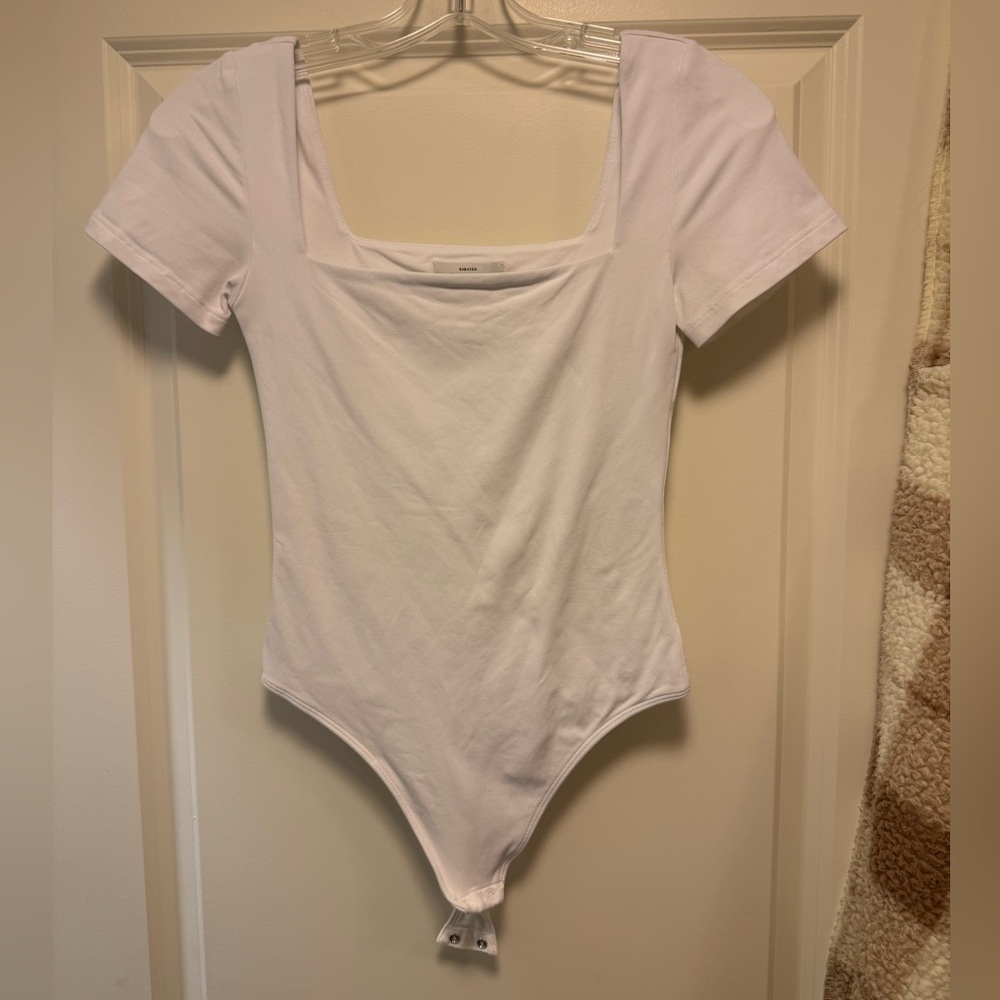 Babaton Cream Short Sleeve Bodysuit